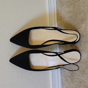 Black suede Everlane slingbacks